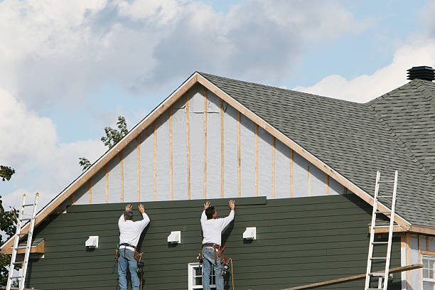 Professional Siding technician working in Wendell, NC